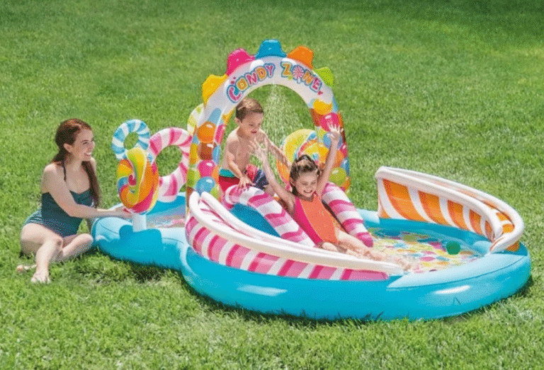 בריכת פעילות מתנפחת לילדים עם מגלשה וקשת Candy Zone על הדשא | 3in100
